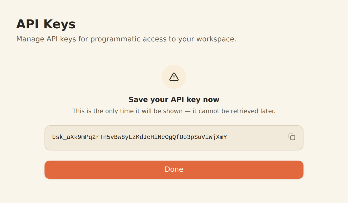 The newly created API key revealed once, with a copy button and a warning that the key will not be shown again.