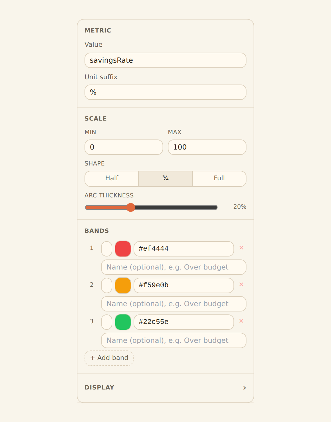 The gauge widget inspector for a savings-rate goal: a three-quarter arc shape, a percent unit, and green/amber/red color bands so the needle's position reads as a status against the scale.