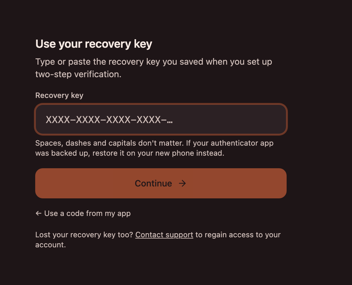The sign-in step titled Use your recovery key, with a Recovery key field, a note that spaces, dashes and capitals don't matter, a Continue button, a link back to using a code from the app, and a Contact support link for a lost key.