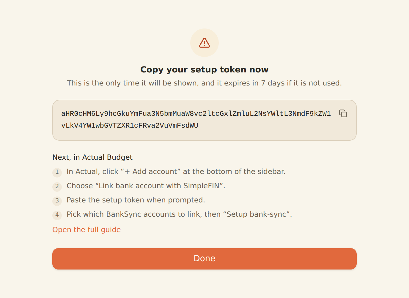 The BankSync SimpleFIN setup token screen: a one-time token in a monospace block with a copy button, followed by numbered steps for pasting it into Actual Budget.