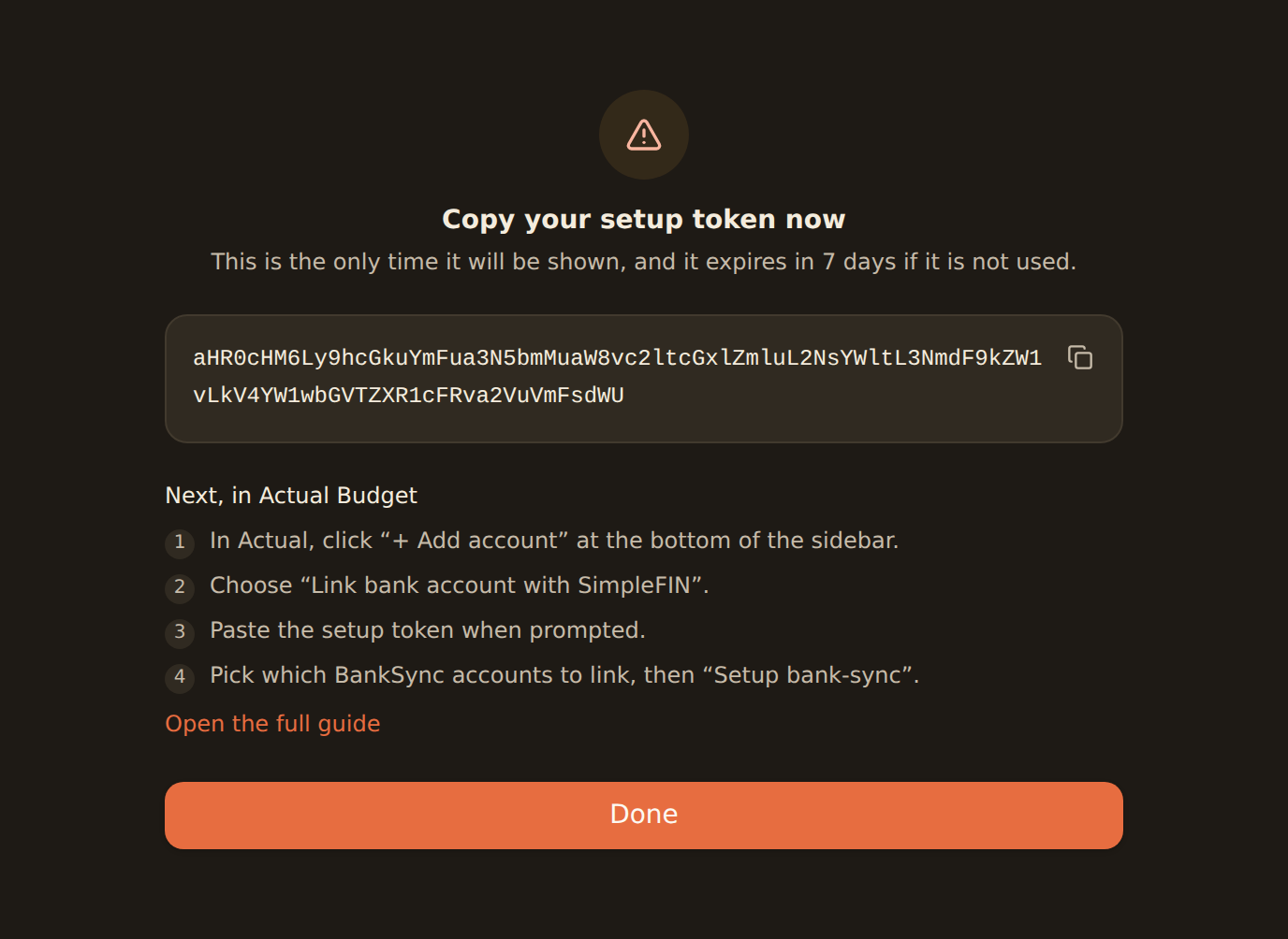 The BankSync SimpleFIN setup token screen: a one-time token in a monospace block with a copy button, followed by numbered steps for pasting it into Actual Budget.